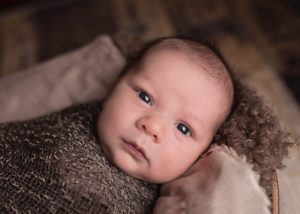 baby swaddled in brown. Jesus For You. Advent Devotion from Immanuel Lutheran Church in Joplin, Missouri. LCMS. Call His Name Jesus.