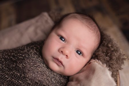 baby swaddled in brown. Jesus For You. Advent Devotion from Immanuel Lutheran Church in Joplin, Missouri. LCMS. Call His Name Jesus.