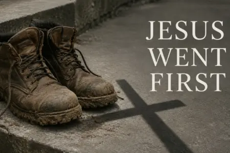 Fourteenth Sunday after Pentecost — "You Went First" (Matthew 16): a pair of worn, mud-caked work boots too big for anyone to fill, sitting alone on a grey stone step.